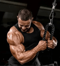 A close-up of a bodybuilder during an intense workout, showcasing the vitality and strength gained from using LUXVAA Nitric Oxide Booster 90 Ct for better blood circulation and exercise performance, an effective health supplement.