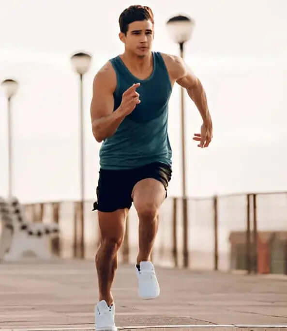 An athlete running outdoors representing the benefits of LUXVAA Nitric Oxide Booster 90 Ct for enhanced exercise performance and improved blood circulation, making it a great health supplement.
